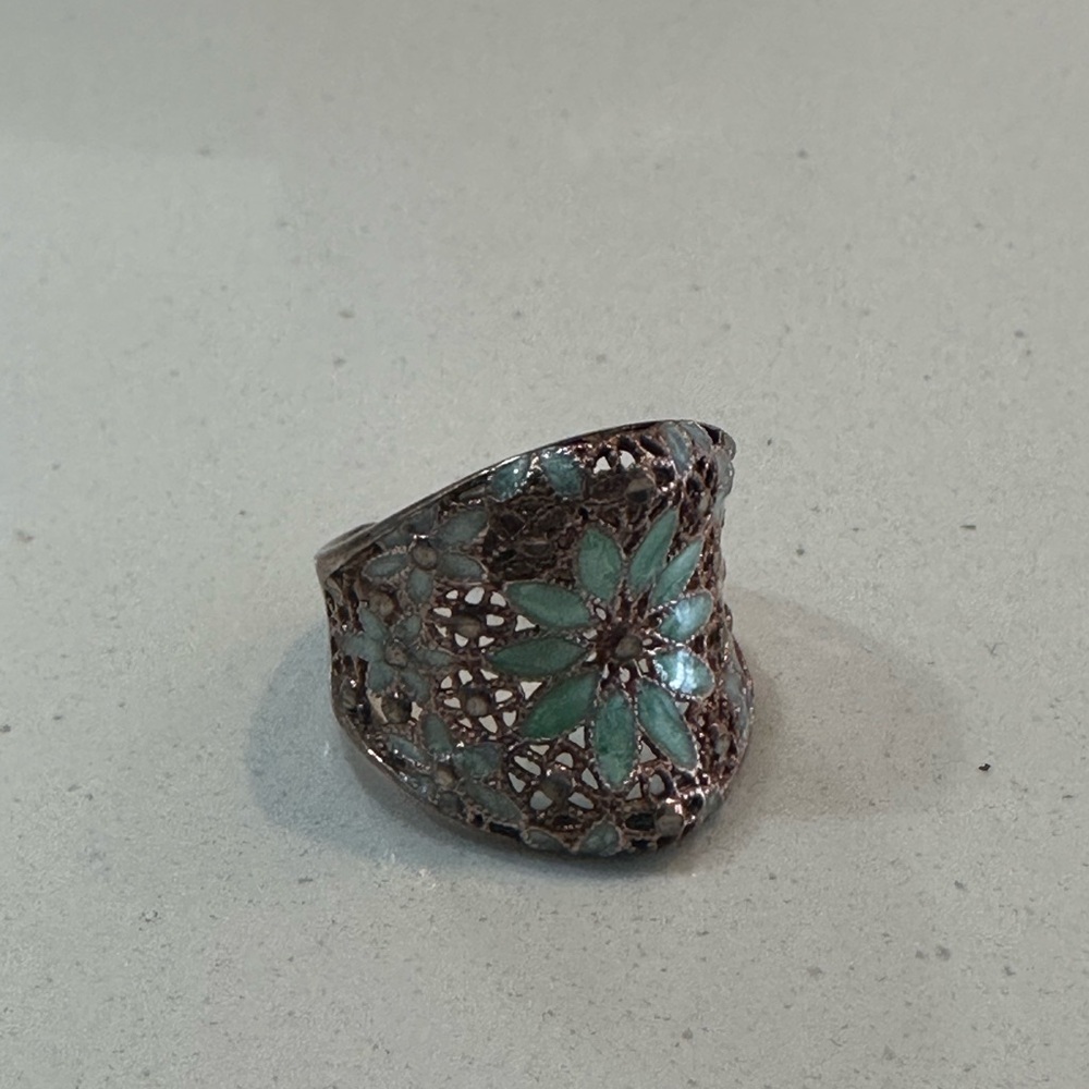 rose gold and blue stone adjustable ring from le ponte vecchio Florence Italy